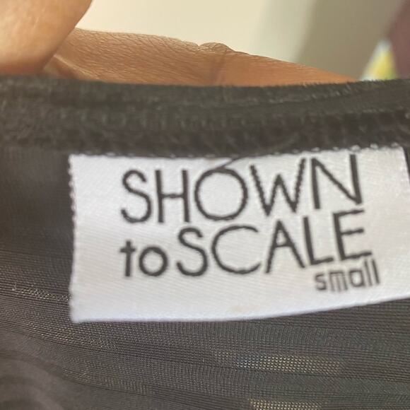 Shown to Scale Small black long-sleeved fit and flare dress - Picture 6 of 8